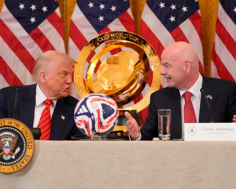 FIFA President Gianni Infantino stands with Donald Trump at the White House