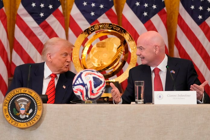 FIFA President Gianni Infantino stands with Donald Trump at the White House