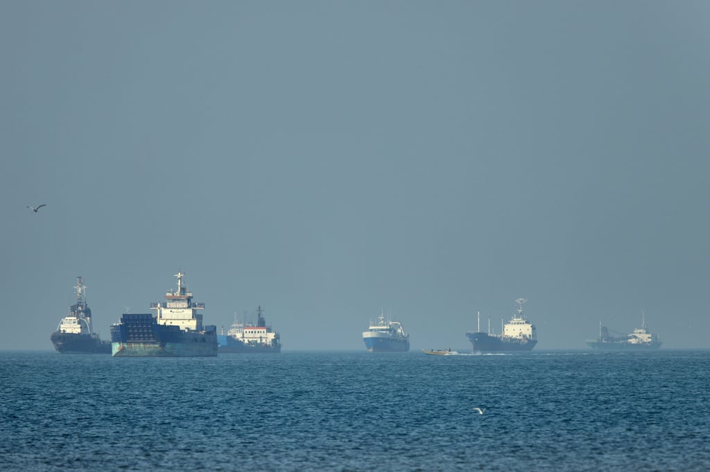 Cargo ships navigate the Strait of Hormuz near Bandar Abbas, Iran as IRGC tolls take effect