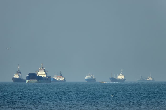 Cargo ships navigate the Strait of Hormuz near Bandar Abbas, Iran as IRGC tolls take effect