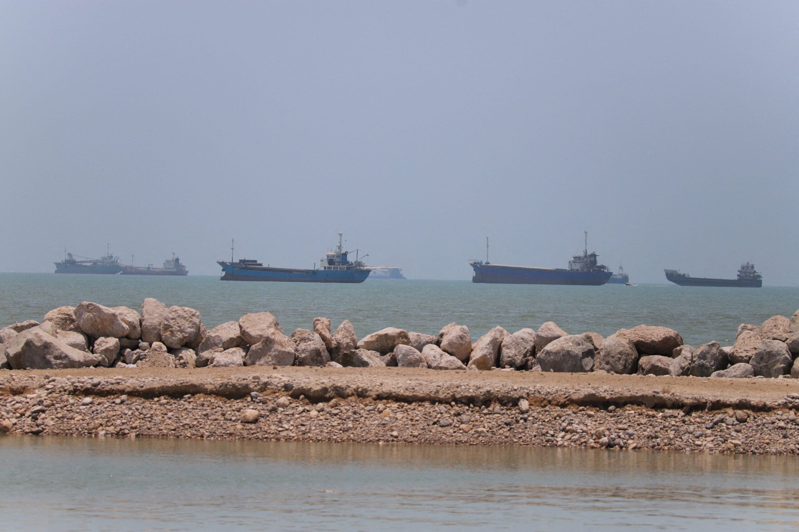 Vessels transiting the Strait of Hormuz near Bandar Abbas Iran in June 2026 amid Iran-US MoU negotiations