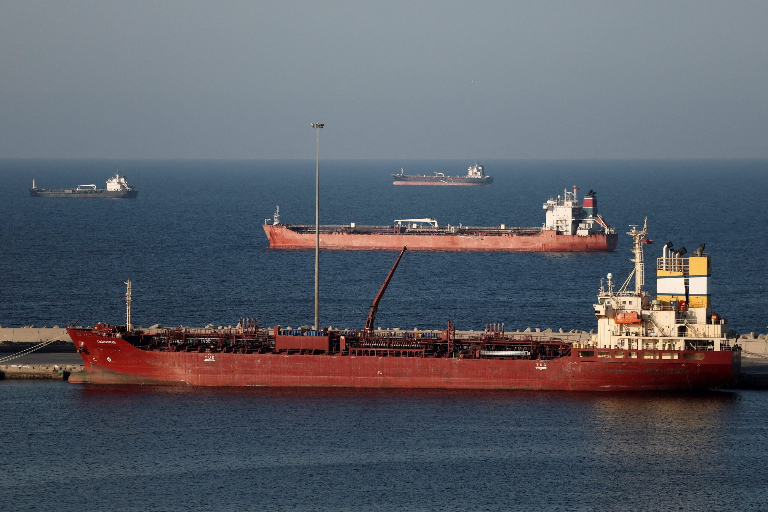 Tanker anchored in Muscat during Iran Hormuz crisis as IRGC demands transit toll rights