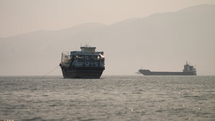 Oil tankers in the Strait of Hormuz as Iran warns vessels to use designated routes or face forceful response