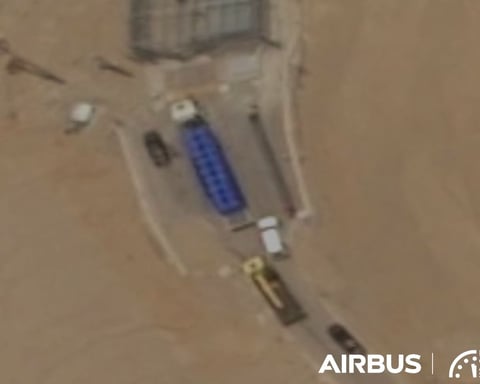 Satellite image showing trucks at Iran's Isfahan underground nuclear complex south tunnel entrance on June 9 2025
