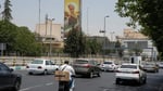 Billboard depicting Khamenei fist in Tehran as Trump pushes Iran ceasefire deal