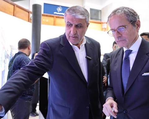 Iran Atomic Energy Organization chief Mohammad Eslami with IAEA Director General Rafael Grossi, whose inspectors cannot verify the location of Iran's 440 kg uranium stockpile