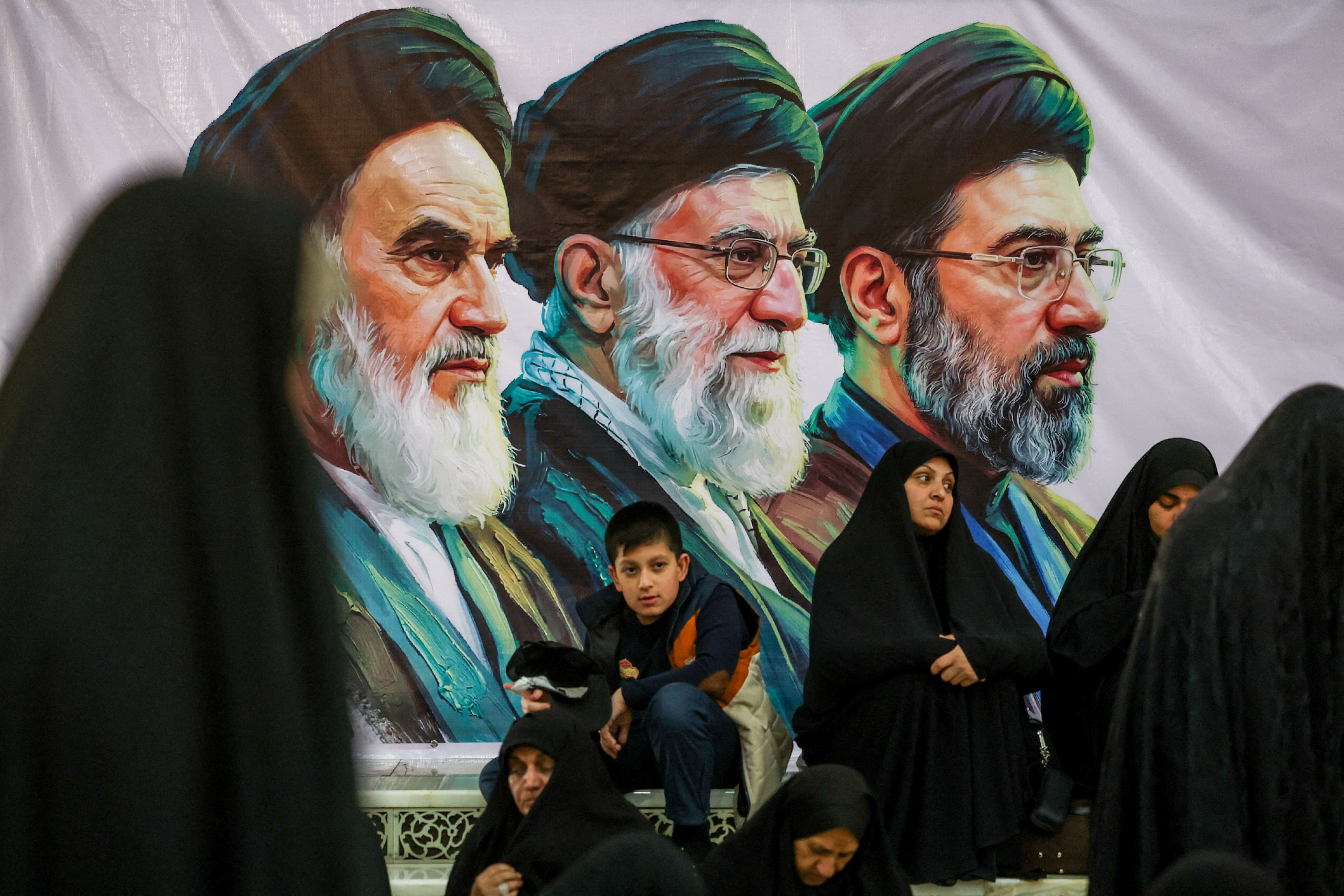 Banner in Tehran showing Khomeini, Ali Khamenei and Mojtaba Khamenei in southern Tehran June 2026