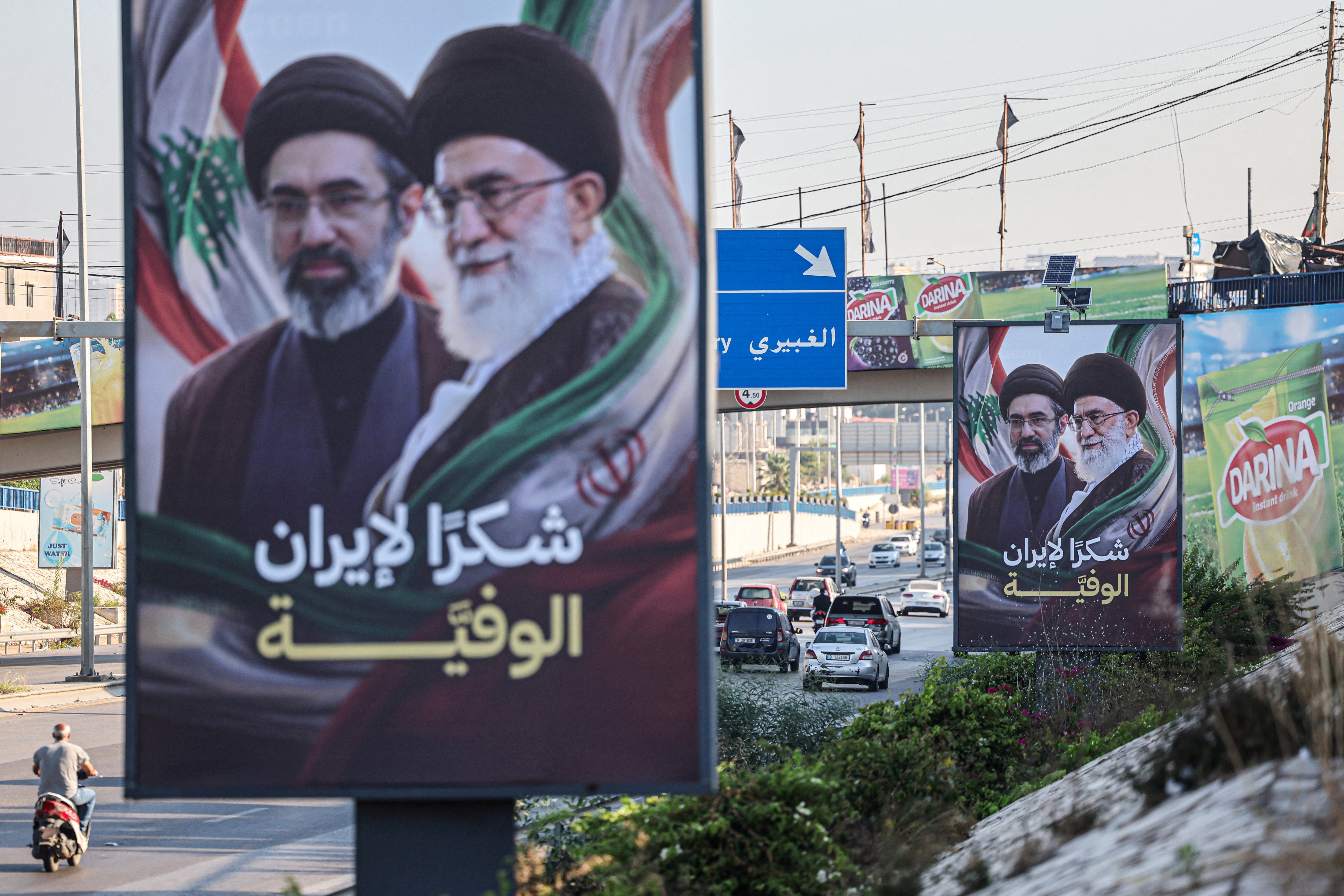 Billboards showing Iran's Supreme Leader on the Beirut airport highway, June 22, 2026
