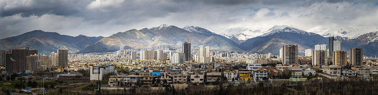 Tehran skyline with snow-capped Alborz mountains in background on a clear day