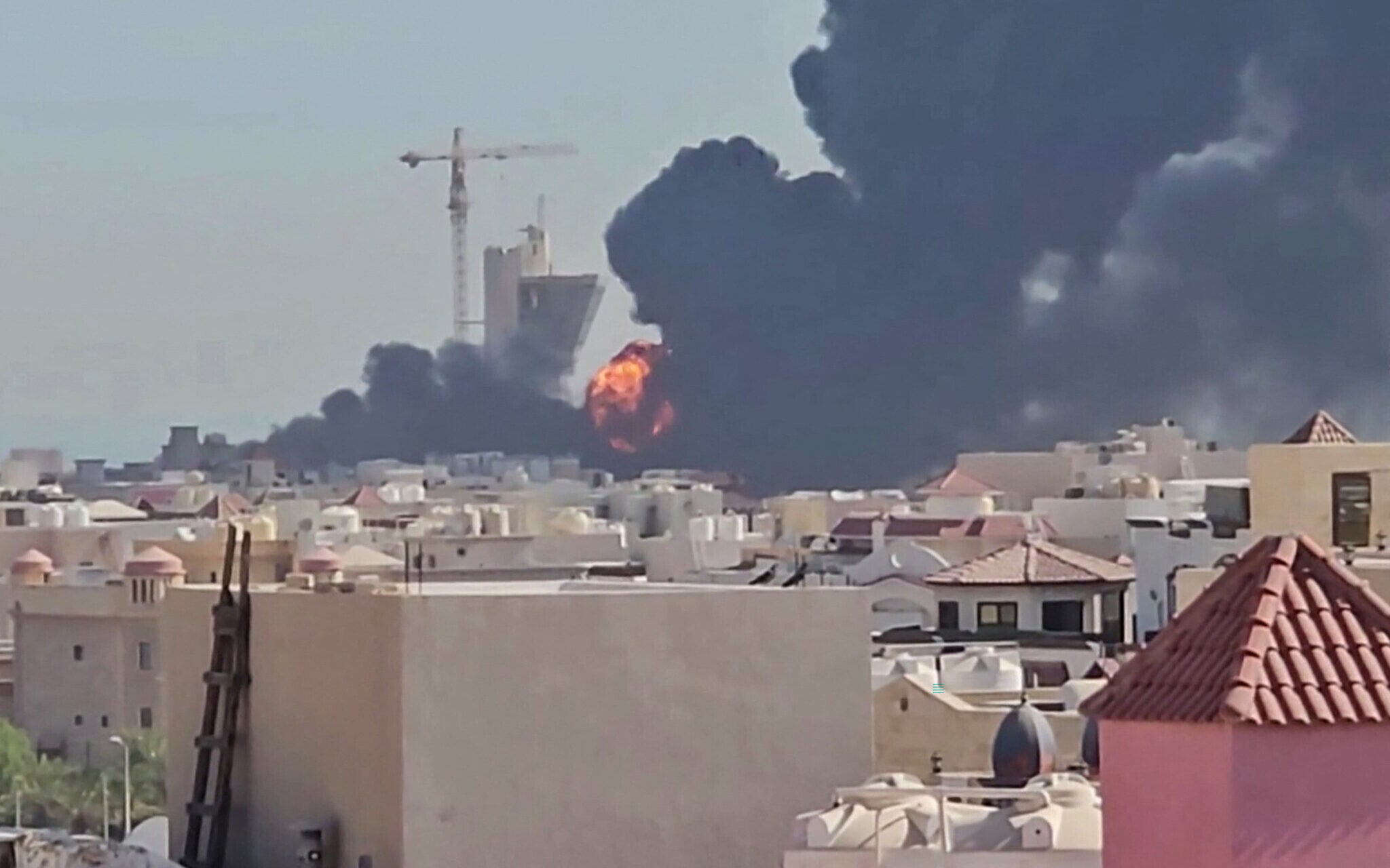 Smoke rises over Kuwait following an Iranian strike as the US-Iran conflict spreads across the Gulf