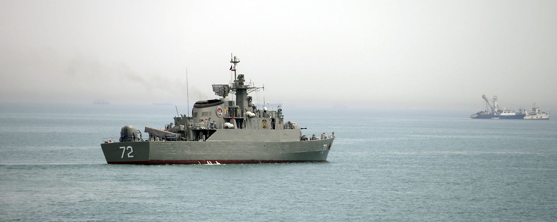 Iranian warship Alborz in the Strait of Hormuz as Iran enforces shipping controls