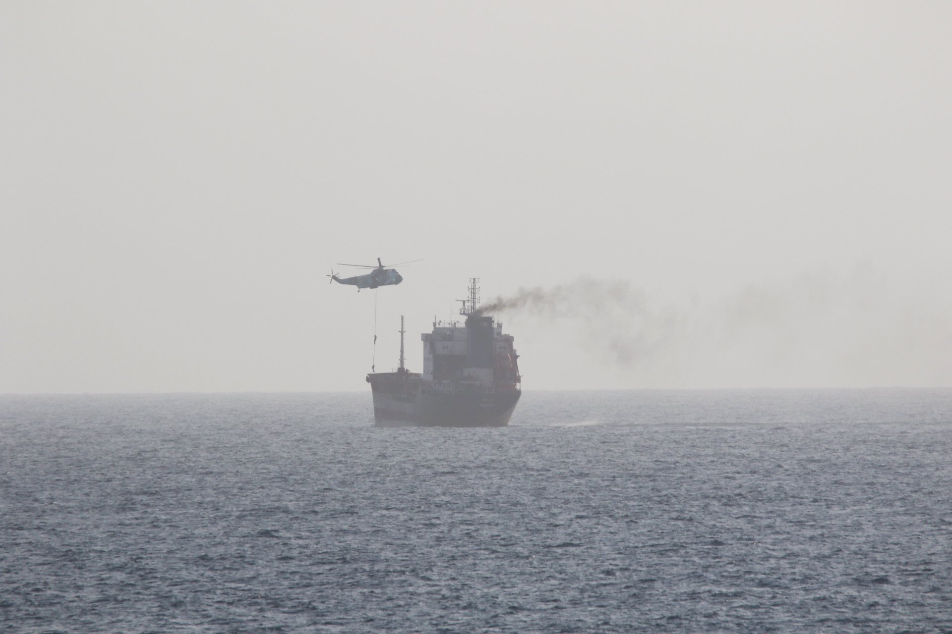 Iranian naval forces boarding a tanker vessel in the Gulf of Oman near the Strait of Hormuz