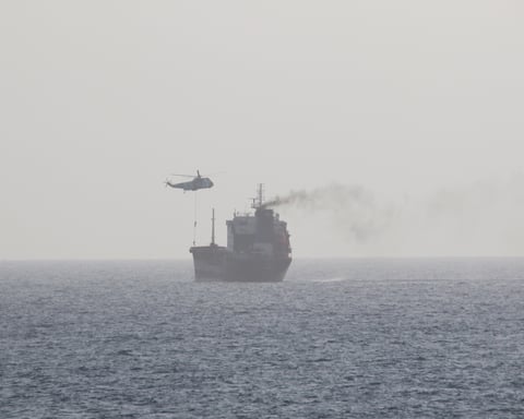 Iranian naval forces boarding a tanker vessel in the Gulf of Oman near the Strait of Hormuz