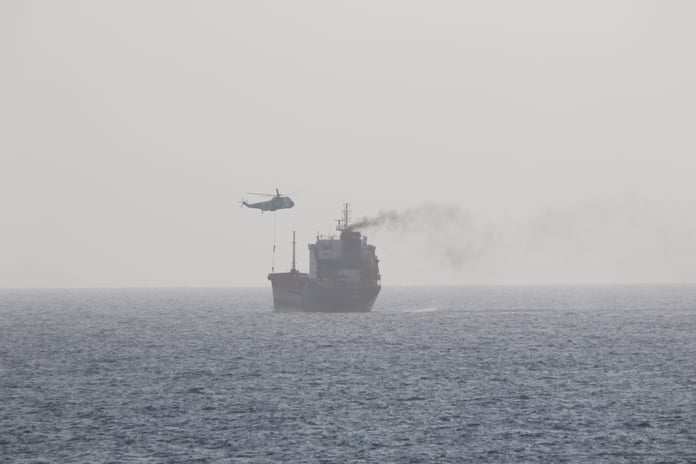 Iranian naval forces boarding a tanker vessel in the Gulf of Oman near the Strait of Hormuz