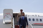 Iraqi Prime Minister Ali al-Zaidi and Iranian President Masoud Pezeshkian shake hands in Tehran