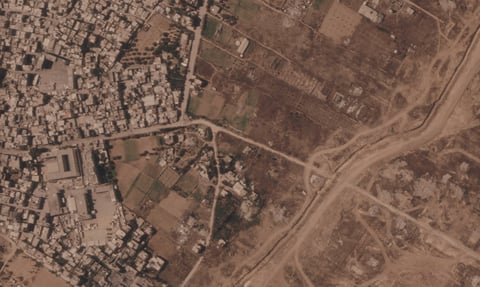 Satellite image showing Israel's earthen barrier cutting through central Gaza along the Yellow Line ceasefire boundary