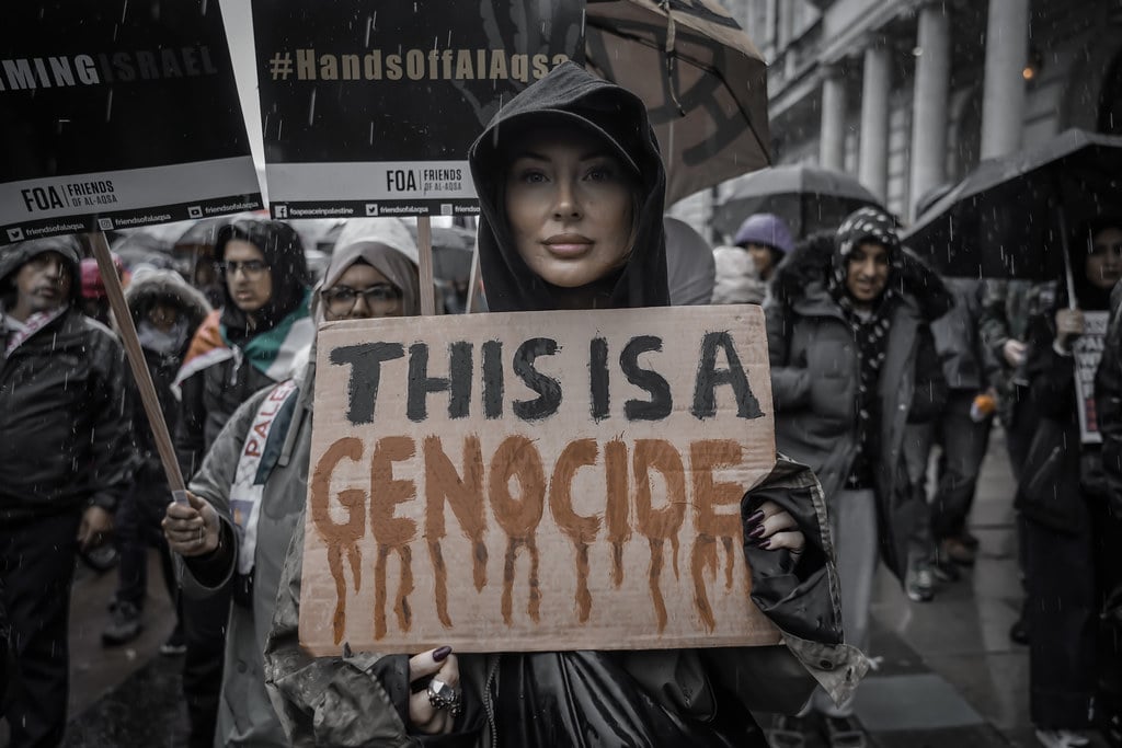 Protesters demonstrating against Israel's military operations and genocide in Gaza at a public rally