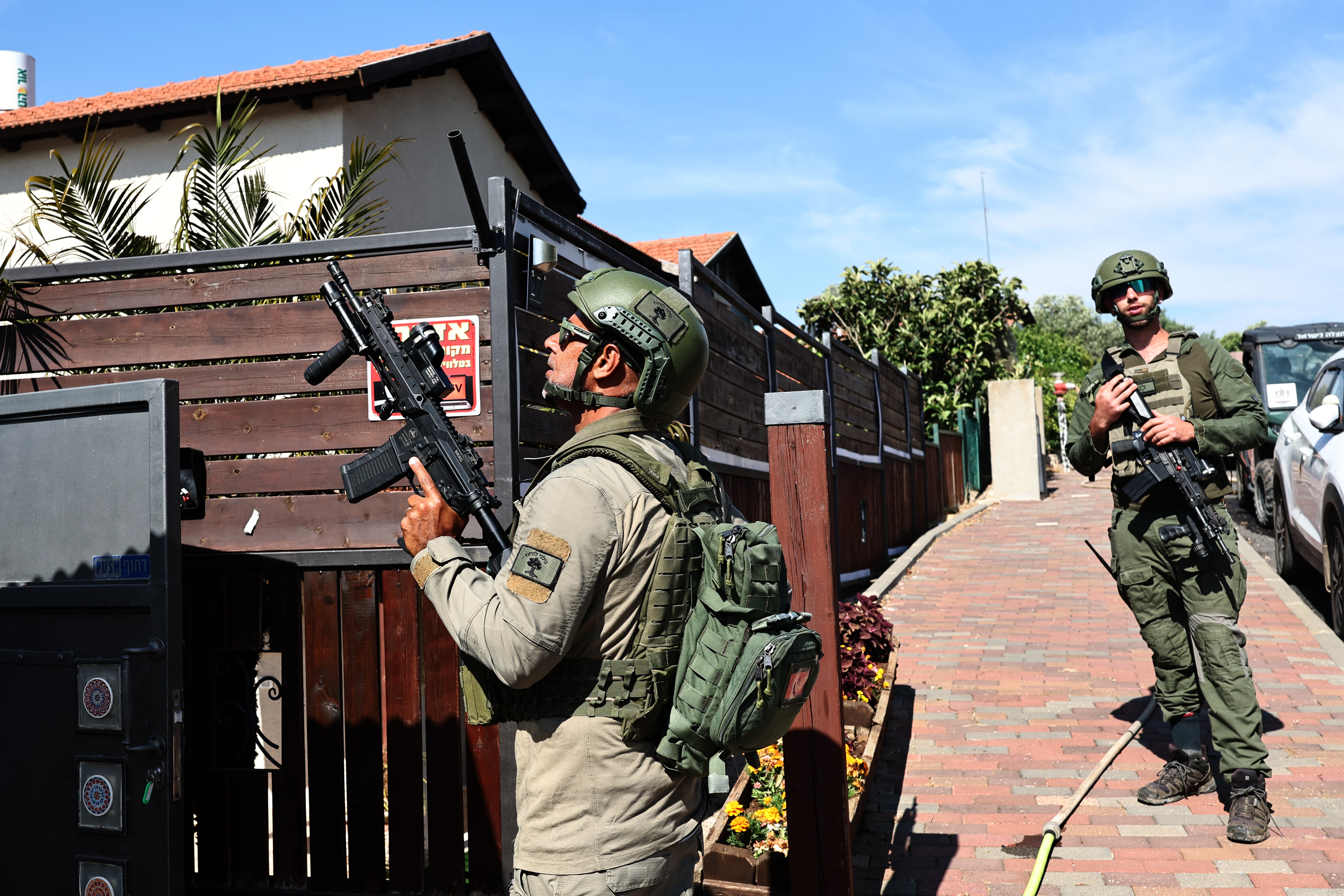 Israeli security personnel scanning for drone in Metula northern Israel July 2026