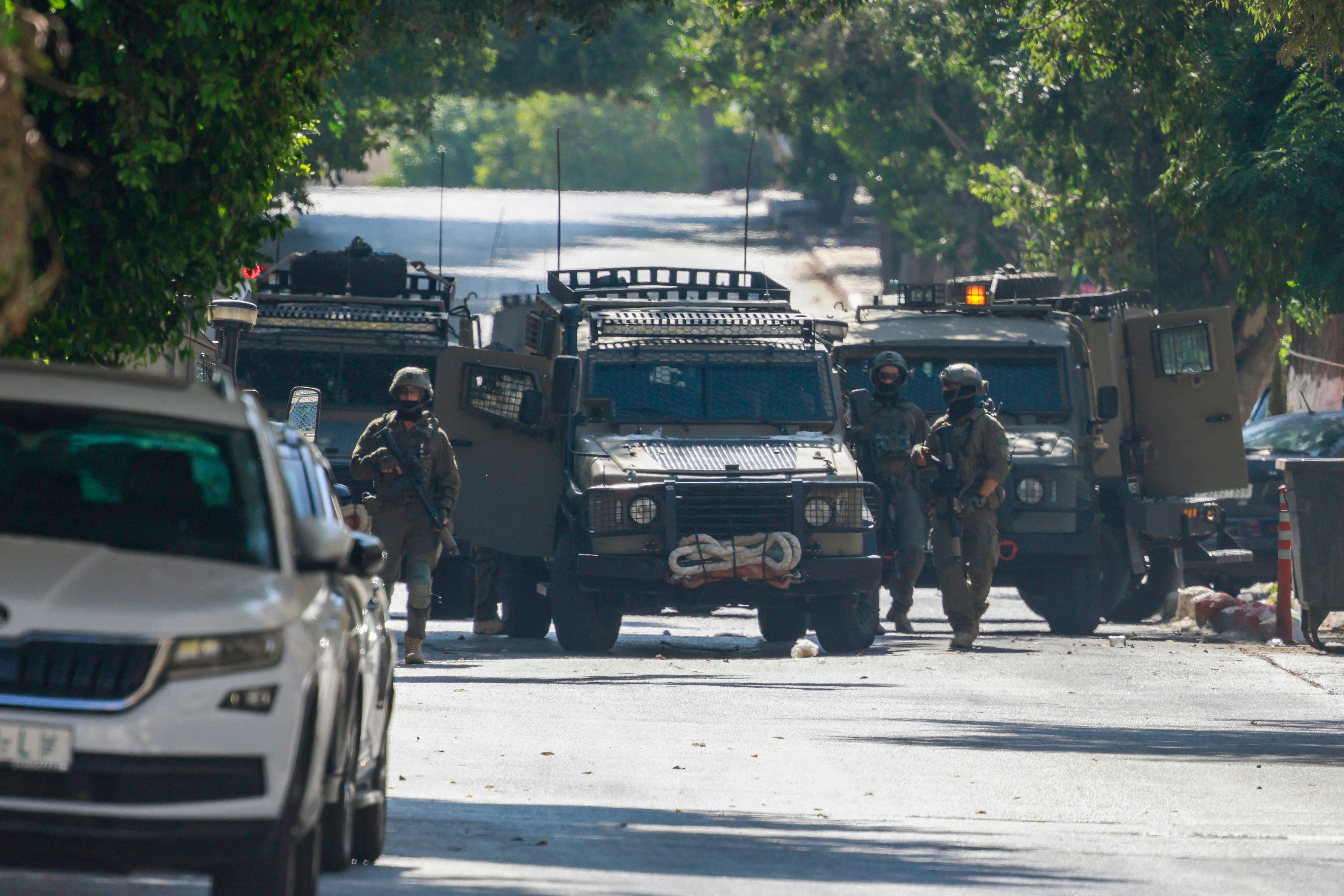 Israeli soldiers conduct operations near Nablus amid West Bank arrests and settler attacks