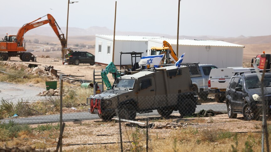 Yellow concrete barrier blocks expanding Israel's military control zone across the Gaza Strip during the ceasefire period