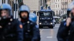 Italian police officers during arrest operation in northern Italy amid nationwide youth crime crackdown