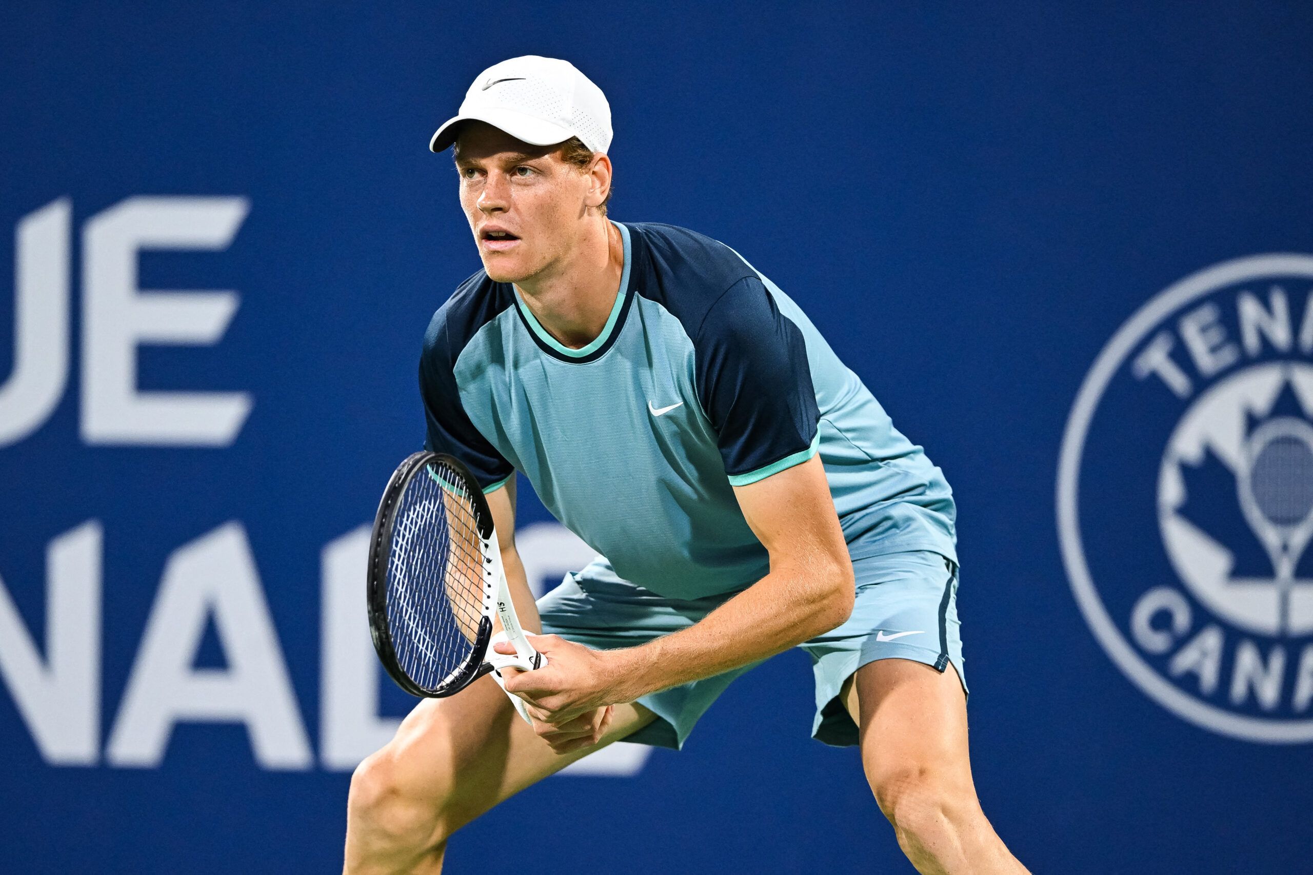 Jannik Sinner waits to receive serve during a 2024 hardcourt match in Montreal