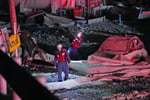 Rescue teams working at the scene of the Aeon Mall collapse following the 7.1 earthquake in Kumamoto Japan July 2026