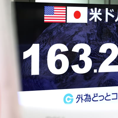 Japanese yen currency exchange rate display as Bank of Japan signals faster rate hikes