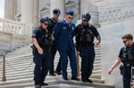 US Capitol Police arrest Air Force Major Jason Watson on Capitol steps during Trump impeachment protest