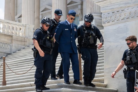 US Capitol Police arrest Air Force Major Jason Watson on Capitol steps during Trump impeachment protest