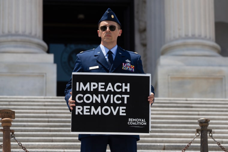 Air Force Major Jason Watson speaks at Capitol steps calling for Trump impeachment
