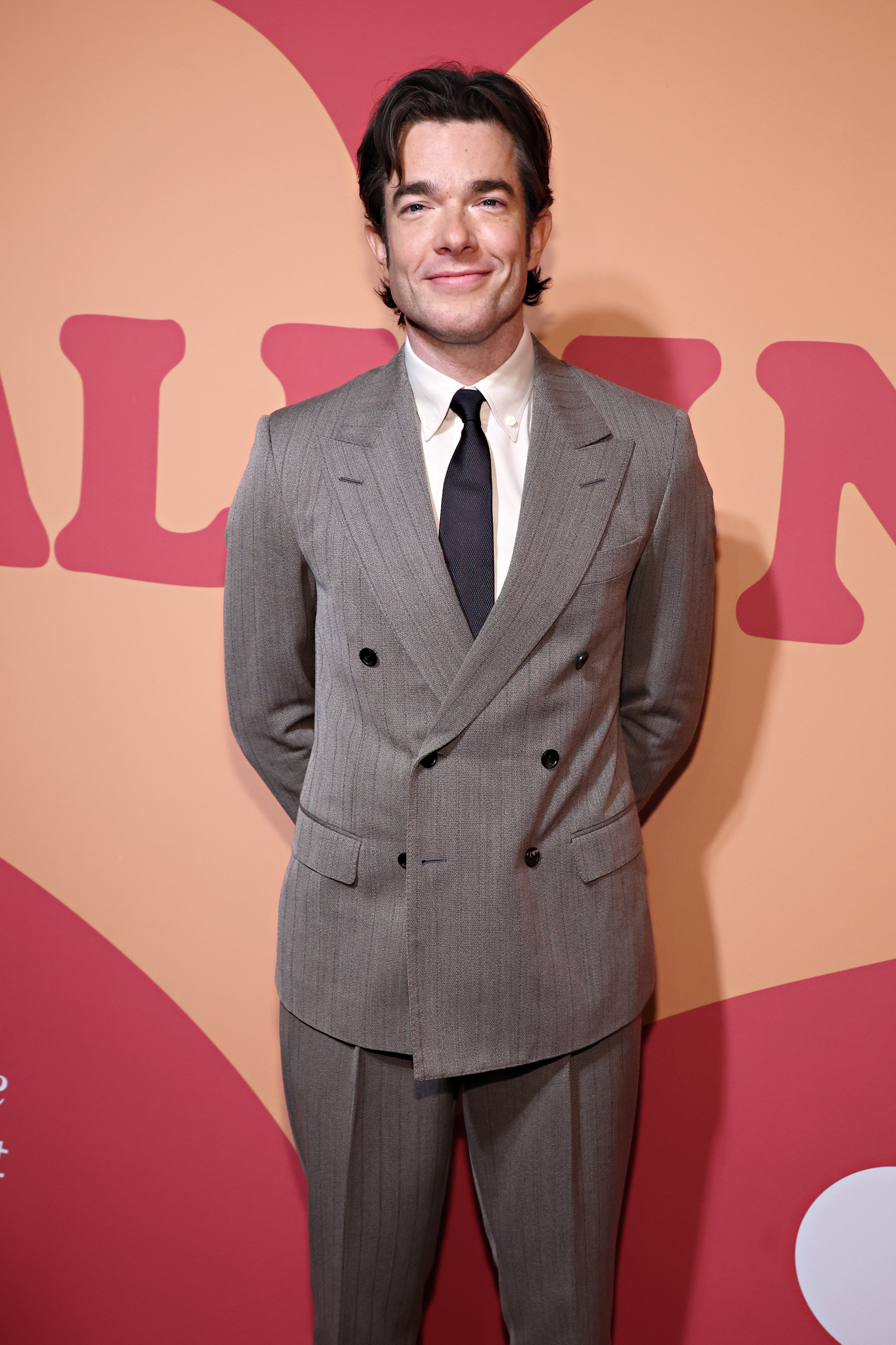 John Mulaney performing stand-up at Wrigley Field in Chicago, July 12, 2026