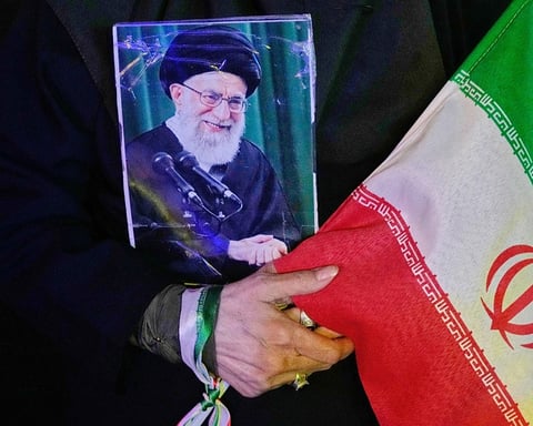 Demonstrators carry portrait of Supreme Leader Ali Khamenei ahead of Iran state funeral July 2026