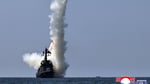 Kim Jong Un watches test launch of strategic cruise missiles from North Korean destroyer Kang Kon