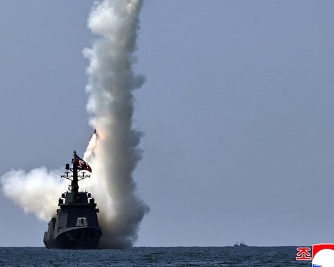 Kim Jong Un watches test launch of strategic cruise missiles from North Korean destroyer Kang Kon