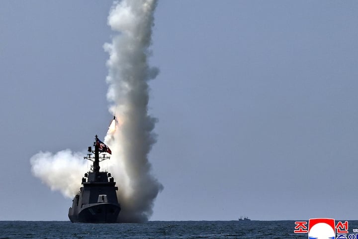 Kim Jong Un watches test launch of strategic cruise missiles from North Korean destroyer Kang Kon