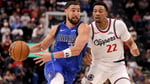 Klay Thompson of the Dallas Mavericks shooting three-pointer Miami Heat trade target 2026 offseason