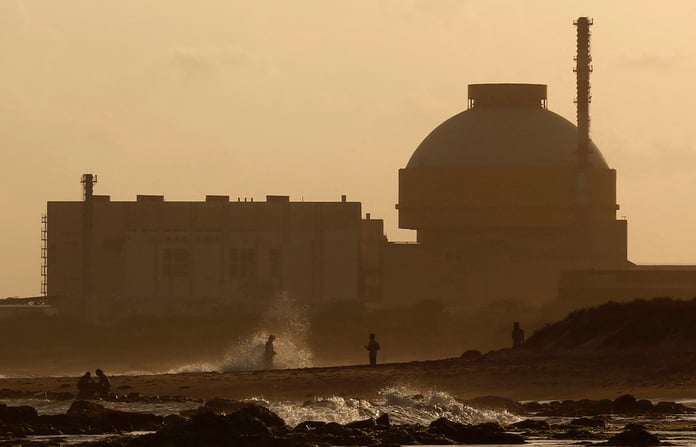 Police patrol beach near Kudankulam Nuclear Power Plant Tamil Nadu India