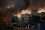 Garage cooperative burning after Russian missile strike on Kyiv residential district July 6 2026
