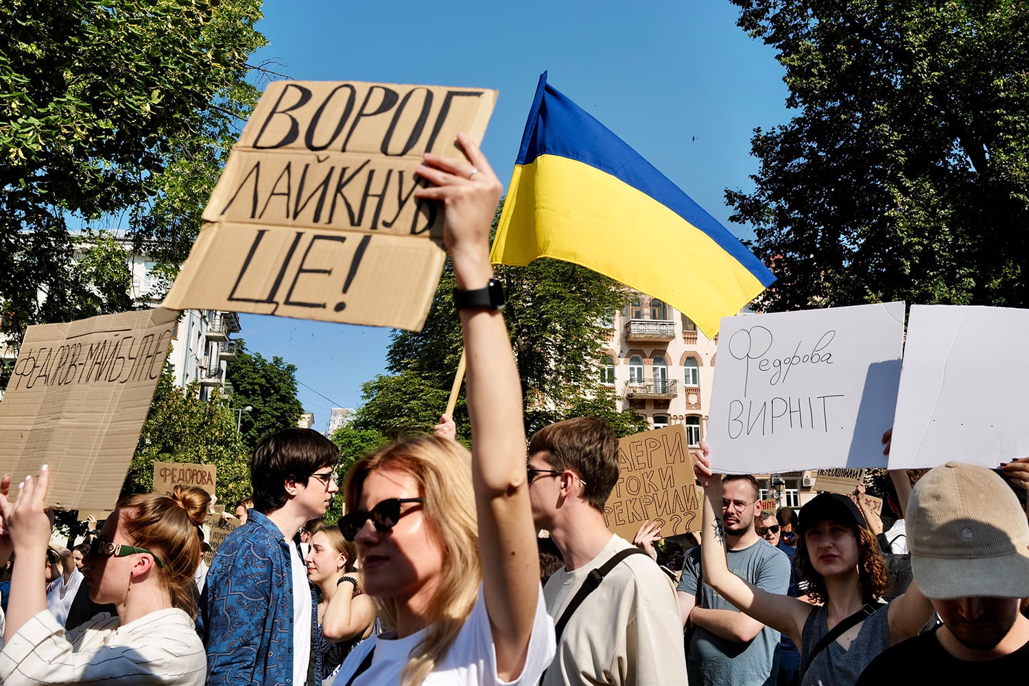 Protesters gather in Kyiv on Thursday over the dismissal of Ukraine's Defence Minister Mykhailo Fedorov by President Zelenskyy