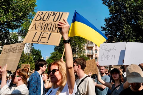 Protesters gather in Kyiv on Thursday over the dismissal of Ukraine's Defence Minister Mykhailo Fedorov by President Zelenskyy