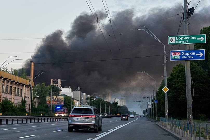 Smoke rises over Kyiv following Russia's largest ballistic missile barrage of the conflict in July 2026