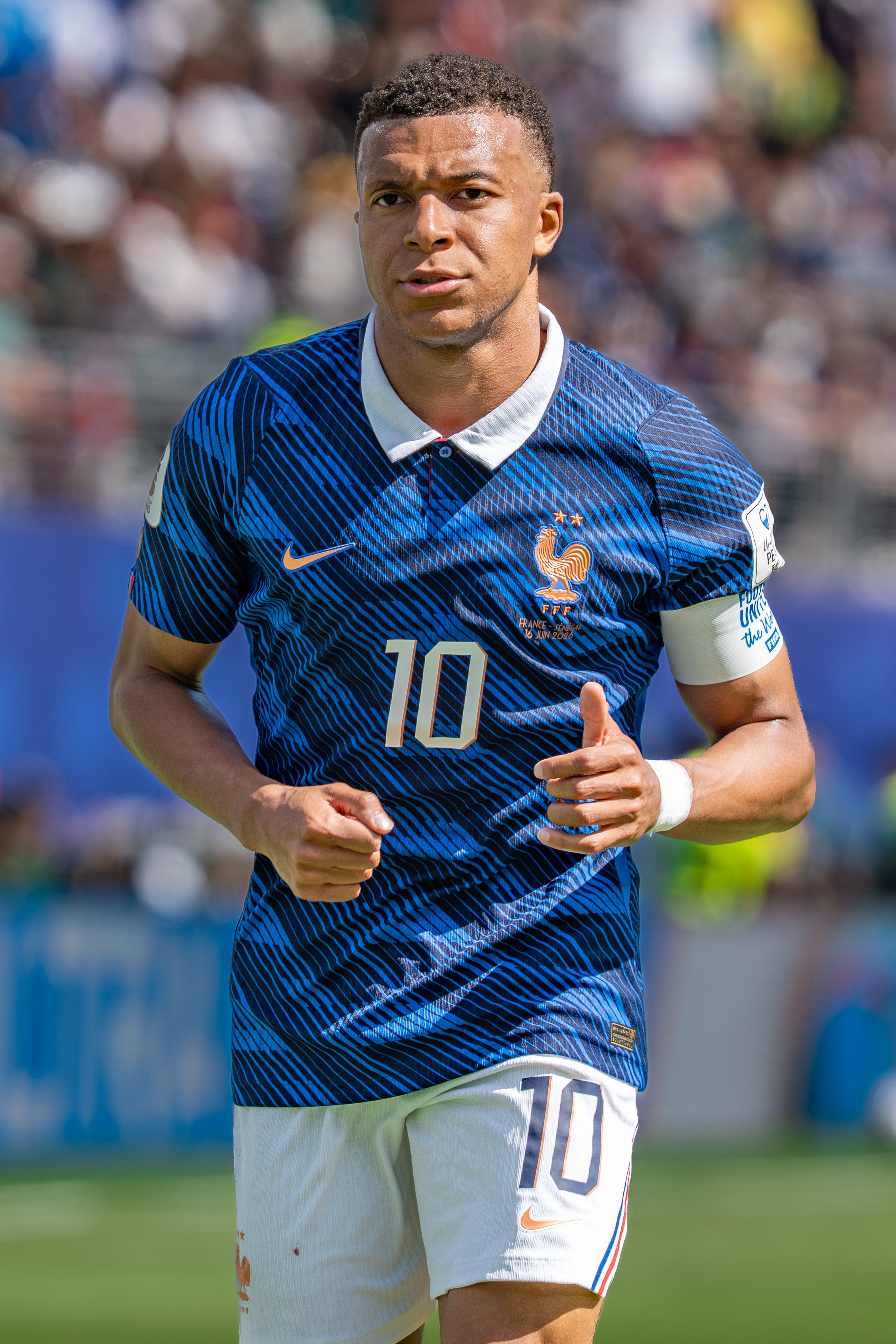 Kylian Mbappe playing for France at the 2026 World Cup, whose penalty beat Paraguay and drew him level with Messi's tournament tally