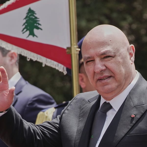 Lebanese President Joseph Aoun gestures to journalists at the Presidential Palace in Baabda, Beirut, before flying to Washington to meet Donald Trump