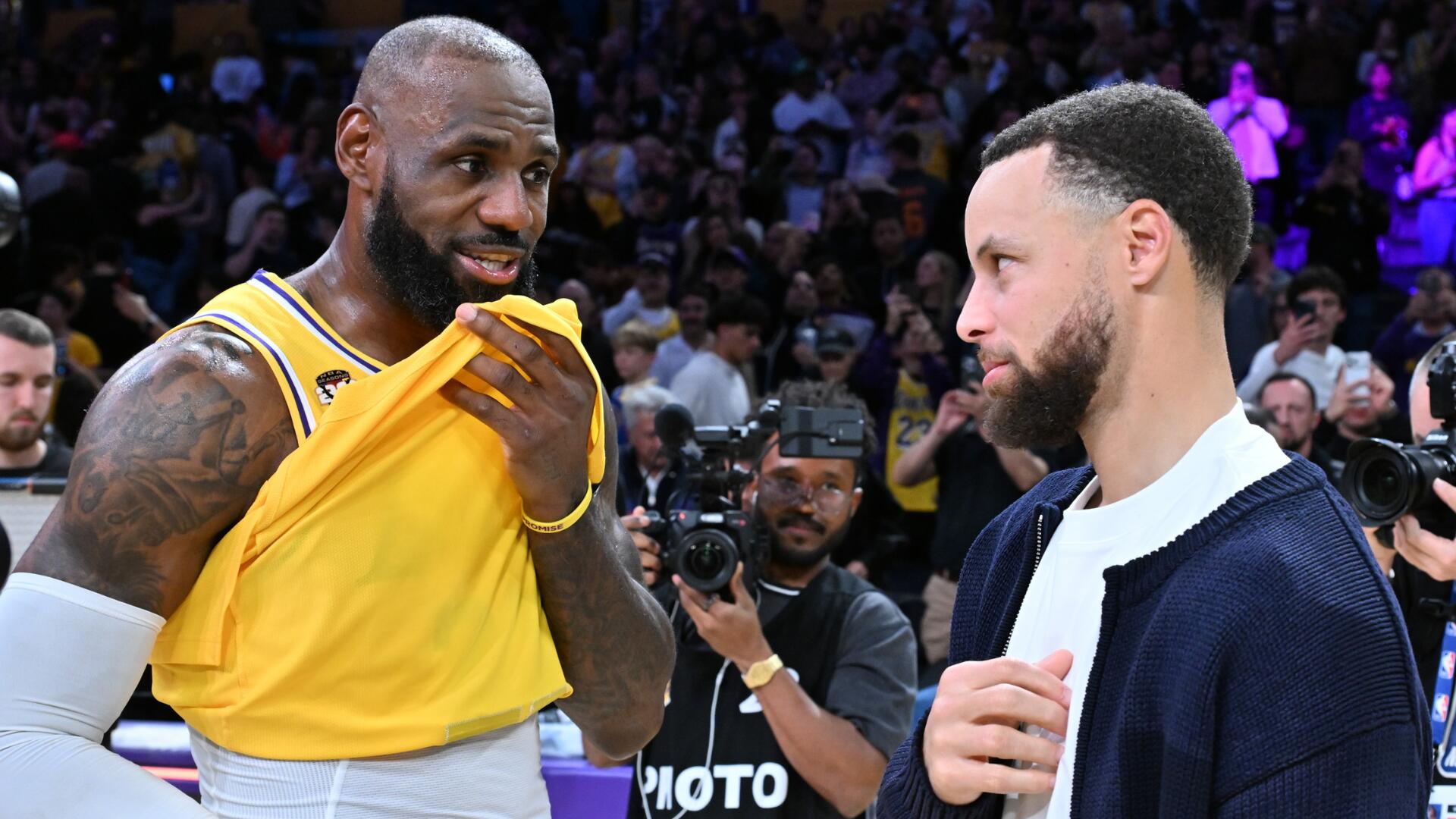 LeBron James and Stephen Curry on court during NBA game 2026