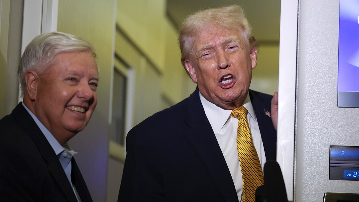 Lindsey Graham and Donald Trump at a White House event in January 2026