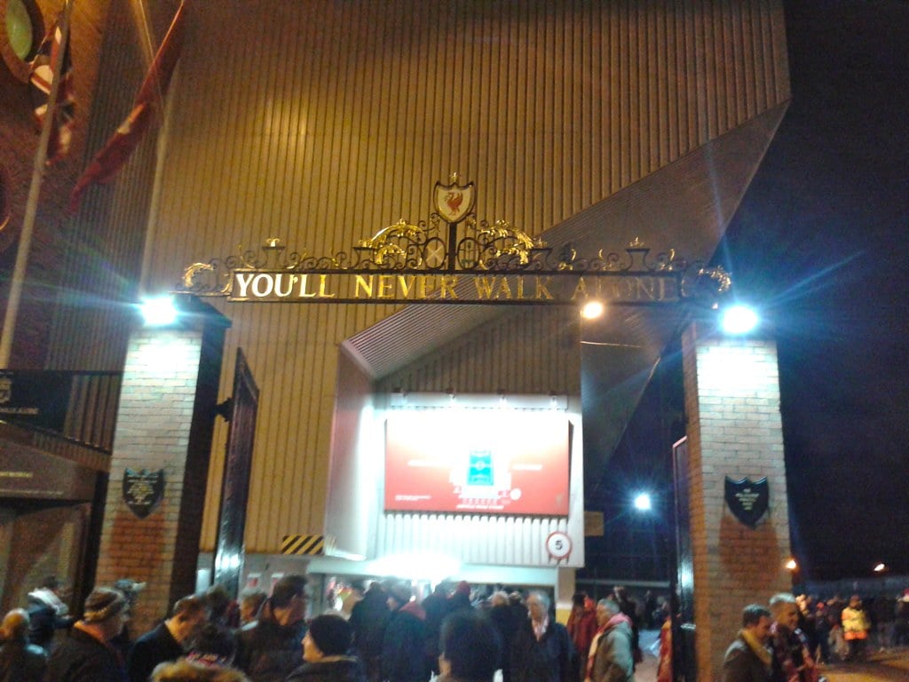 Liverpool FC supporters at Anfield stadium as Fenway Sports Group fields minority stake interest from Mittal-backed consortium