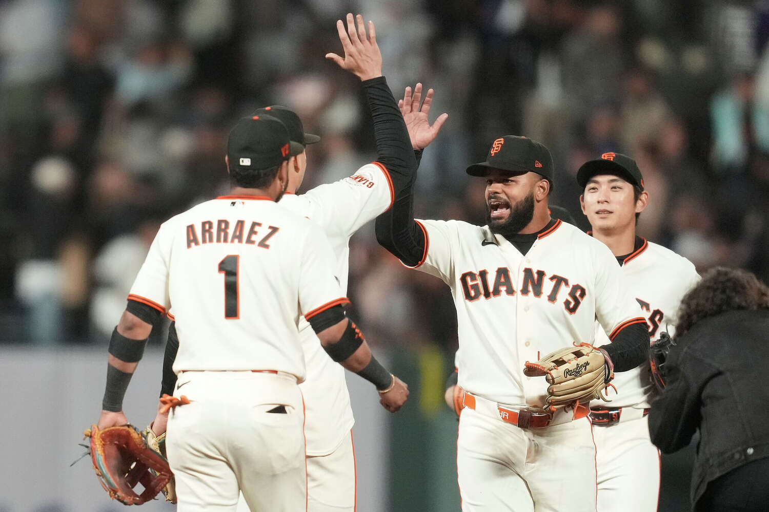 Luis Arraez celebrates with San Francisco Giants teammates at Oracle Park during the 2026 season