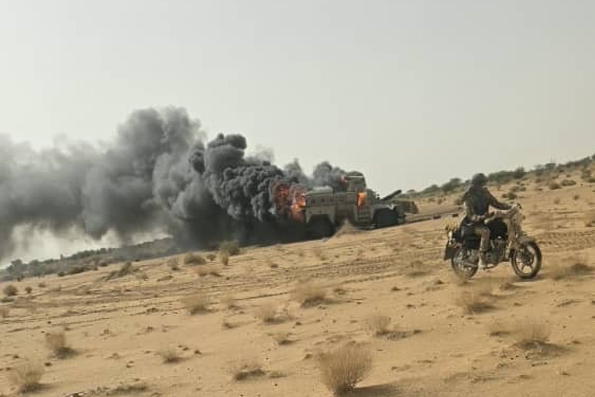 Burning vehicle from Mali military convoy attack near Tabankort by JNIM and Tuareg separatists that killed 50 soldiers