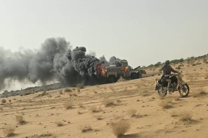 Burning vehicle from Mali military convoy attack near Tabankort by JNIM and Tuareg separatists that killed 50 soldiers